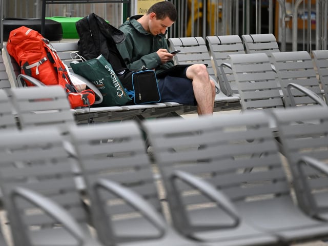 Members of the public pass through Central Station on June 21, 2022 in Glasgow, Scotland. The biggest rail strikes in 30 years started on Monday night with trains cancelled across the UK for much of the week (Photo by Jeff J Mitchell/Getty Images)