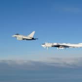 A RAF Typhoon monitoring a Russian Tupolev Tu-142 maritime reconnaissance and anti-submarine warfare (ASW) aircraft. Picture: MoD/Crown Copyright/PA Wire