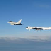 A RAF Typhoon monitoring a Russian Tupolev Tu-142 maritime reconnaissance and anti-submarine warfare (ASW) aircraft. Picture: MoD/Crown Copyright/PA Wire