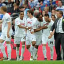 Stephen Dobbie celebrates with Swansea manager Brendan Rodgers having scored their third goal in a 4-2 win over Reading in the Championship Play-off final at Wembley. Photo by Dan Rowley/Shutterstock (7442650ad)