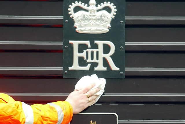 Nameplate of the locomotive Queen's Messenger which hauled the Royal Train from 2004. Picture: Andrew Parsons/Press Association