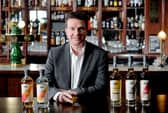 ASC boss David Ridley with products from the firm's J.G. Thomson brand that was unveiled in November. Picture: Colin Hattersley Photography.