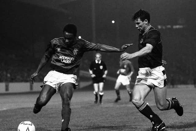 Rangers winger Mark Walters takes on Hearts' Kenny Black in a Skol Cup semi-final in 1988