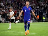 Harry Kane of England celebrates after scoring their team's first goal from the penalty spot during the UEFA Nations League League A Group 3 match between Germany and England at Allianz Arena in June. (Photo by Martin Rose/Getty Images)