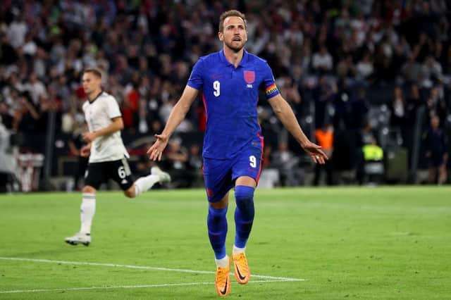 Harry Kane of England celebrates after scoring their team's first goal from the penalty spot during the UEFA Nations League League A Group 3 match between Germany and England at Allianz Arena in June. (Photo by Martin Rose/Getty Images)