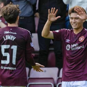 Hearts' summer signings Kyosuke Tagawa and Alex Lowry celebrate after they combined to wrap up their 4-0 Viaplay Cup victory over Partick Thistle and book a place in the quarter-finals. Photo by Mark Scates / SNS Group