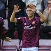 Hearts' summer signings Kyosuke Tagawa and Alex Lowry celebrate after they combined to wrap up their 4-0 Viaplay Cup victory over Partick Thistle and book a place in the quarter-finals. Photo by Mark Scates / SNS Group