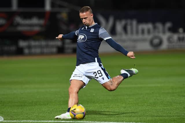 Leigh Griffiths warming up before the match at Dens Park. Picture: SNS