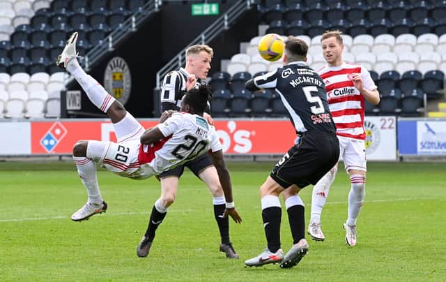 Hamilton's David Moyo attempts an overhead kick against St Mirren.