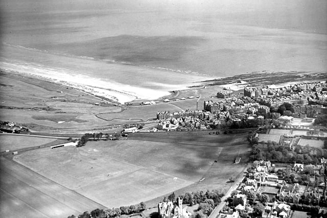 An aerial view of St Andrews Old Course with the North Sea in the background taken in 1960.