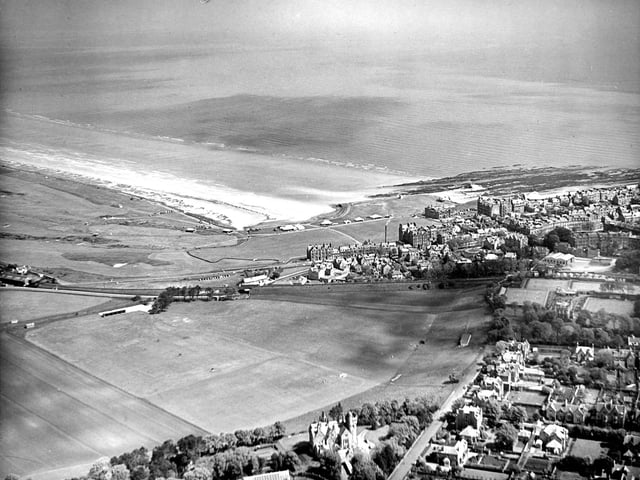 An aerial view of St Andrews Old Course with the North Sea in the background taken in 1960.