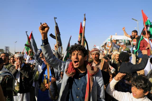 Yemeni demonstrators shout slogans during a protest following US and British forces strikes, in the Huthi-controlled capital Sanaa. Picture: Mohammed Huwais/AFP via Getty Images