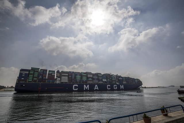 Traffic on the narrow waterway dividing continental Africa from the Sinai Peninsula stopped on Tuesday after the MV Ever Given, a Panama-flagged container ship with an owner listed in Japan, got stuck. (Photo by Khaled DESOUKI / AFP)