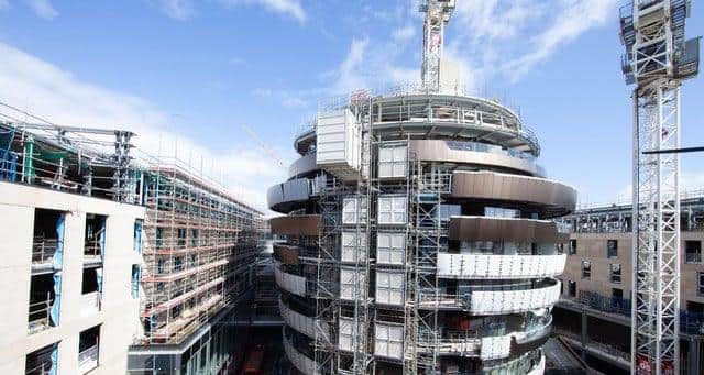 The W hotel is clearly recognisable with its distinctive ribbon design. Pic: John Gilchrist.