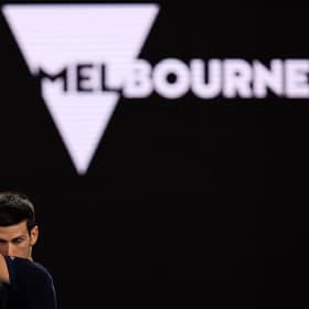 Novak Djokovic will not defend his Australian Open title after being deported from the country. (Photo by MARTIN KEEP/AFP via Getty Images)