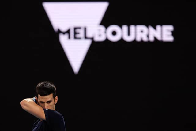 Novak Djokovic will not defend his Australian Open title after being deported from the country. (Photo by MARTIN KEEP/AFP via Getty Images)