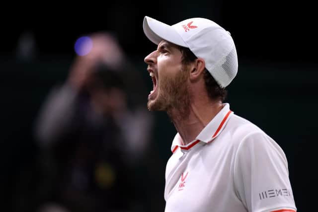 Andy Murray reacts during his second round match against Oscar Otte on centre court