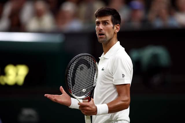 Novak Djokovic who says he will not defend his Wimbledon or French Open titles if the tournaments require mandatory vaccination for competitors. PA