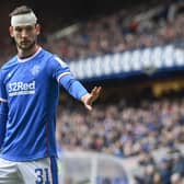 Rangers defender Borna Barisic had to be bandaged up early on with a head knock.
