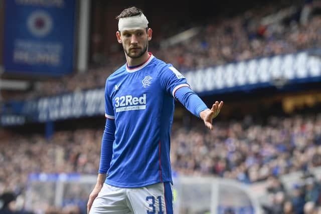 Rangers defender Borna Barisic had to be bandaged up early on with a head knock.