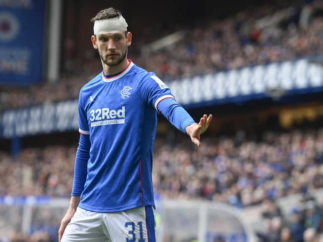 Rangers defender Borna Barisic had to be bandaged up early on with a head knock.