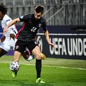 Englands Eberechi Eze (L) fights for the ball with Croatia's Mario Vuskovic during the UEFA Under21 Championship  (Photo by JURE MAKOVEC/AFP via Getty Images)