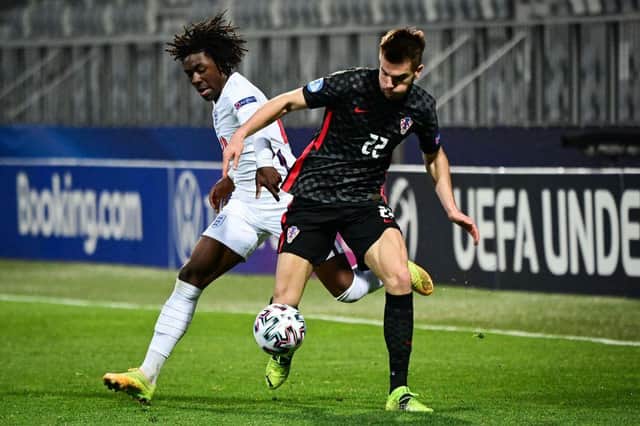 Englands Eberechi Eze (L) fights for the ball with Croatia's Mario Vuskovic during the UEFA Under21 Championship  (Photo by JURE MAKOVEC/AFP via Getty Images)