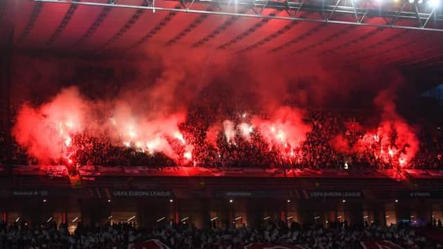 Rangers supporters light flares at the Europa League quarter-final, first leg match against Braga in Portugal on April 7. (Photo by Craig Foy / SNS Group)