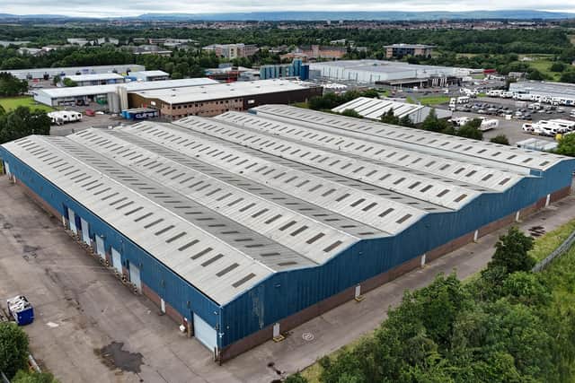 The vast building occupies a six-acre site within Bellshill Industrial Estate, North Lanarkshire, and is commonly known as the Big Blue Shed.
