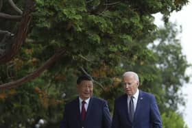President Joe Biden and China's President President Xi Jinping walk in the gardens at the Filoli Estate in Woodside, Caliornia, Wednesday, on the sidelines of the Asia-Pacific Economic Cooperative conference.