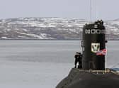 A submarine at a base in the town of Severomorsk, near Murmansk, on Russia's north coast (Picture: Alexander Nemenov/AFP via Getty Images)