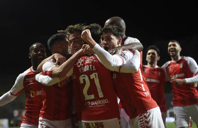 Braga's players celebrate a goal by Andre Horta during their impressive 3-2 win over Benfica in a Portuguese Primeira Liga match last Friday night. (Photo by MIGUEL RIOPA/AFP via Getty Images)