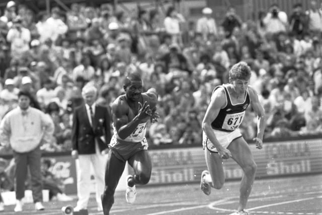 Canada's Ben Johnson leading Scotland's Jamie Henderson in the men's 100m sprint at the Edinburgh Commonwealth Games.