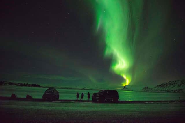 The Northern Lights dance across an Icelandic sky (Picture: Halldor Kolbeins/AFP via Getty Images)