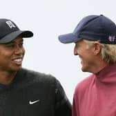 Tiger Woods and Greg Norman pictured during the 2004 Open at Royal Troon. Woods is not a fan of Norman in his role as LIV Golf CEO and commissioner. Picture: Ross Kinnaird/Getty Images.