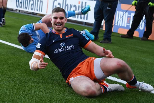A happy James Lang celebrates Edinburgh's fourth try in the 34-10 victory over Cardiff. (Photo by Paul Devlin / SNS Group)
