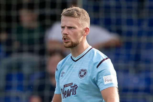 Stephen Kingsley was booked for his reaction after being grabbed in the throat by Rangers midfielder Juninho Bacuna (Photo by Craig Foy / SNS Group)