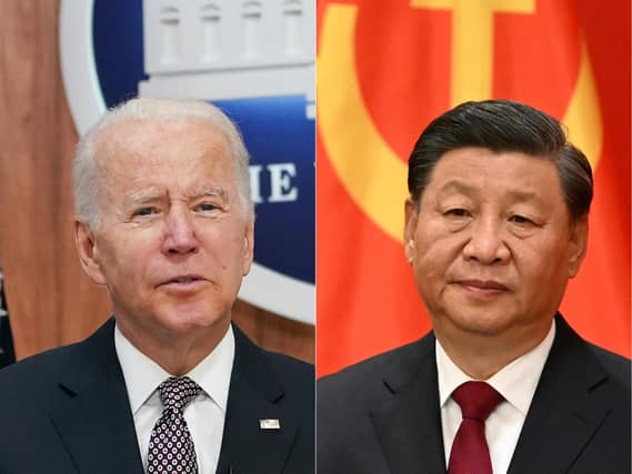 US President Joe Biden (left) spoke on China's President Xi Jinping (right) a day after talks between the two superpowers in Beijing. Picture: Mandel Ngan, Noel Celis/AFP via Getty Images