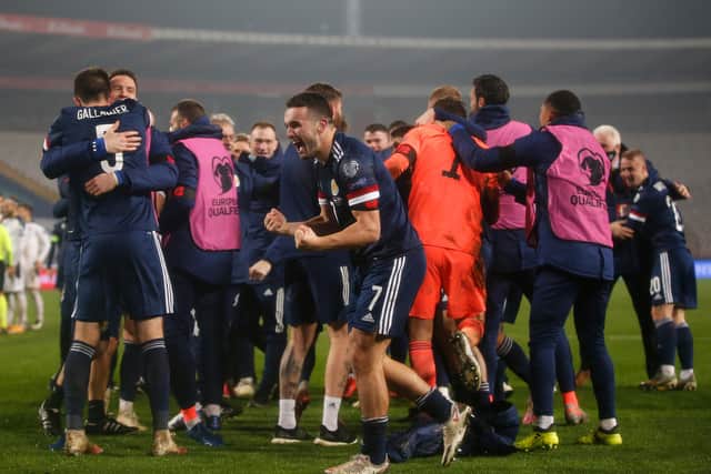 John McGinn celebrates Scotland's win over Serbia in the Euro 2020 play-off final in Belgrade. Picture: Srdjan Stevanovic/Getty Images