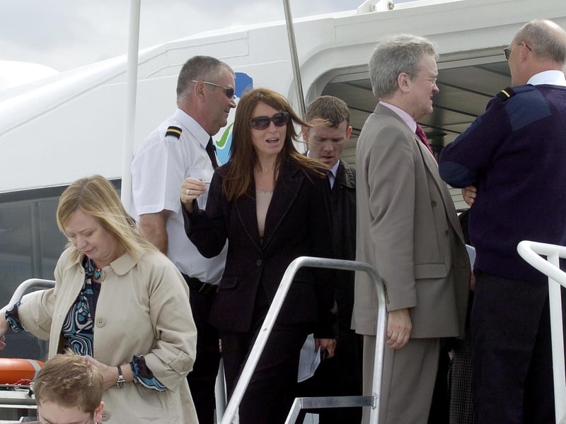 Passengers exit the hovercraft after landing in Portobello