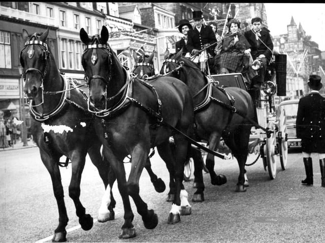 In the 1960s Edinburgh Festival performers would parade along Princes Street. This picture was taken in 1962 and shows members of the cast of 'The Doctor and the Devils' at the Assembly Hall in a handsome Gilby coach-and-four horse drawn carriage.