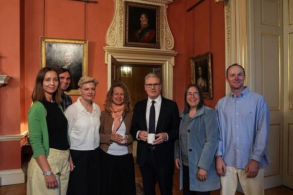 Prime Minister Keir Starmer with families involved in the consultation process for online restrictions, before holding a press conference at Downing Street this week to announce government action to protect children online. (Picture: Carlos Jasso / Pool/ AFP via Getty Images)