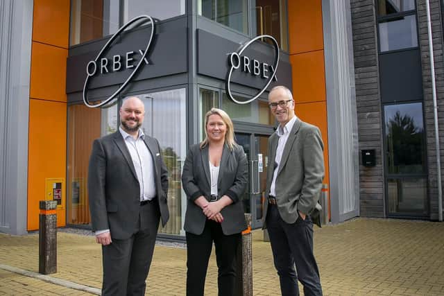 From left: Alastair McMillen of the Scottish National Development Bank, Nicola Douglas of the SNIB, and Orbex chief financial officer Simon Beswick at Orbex facilities in Forres, Moray. Picture: contributed.