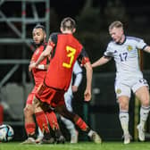 Dundee's Lyall Cameron scores for Scotland Under-21s in the 2-0 victory in Belgium. (Photo by BRUNO FAHY/BELGA MAG/AFP via Getty Images)
