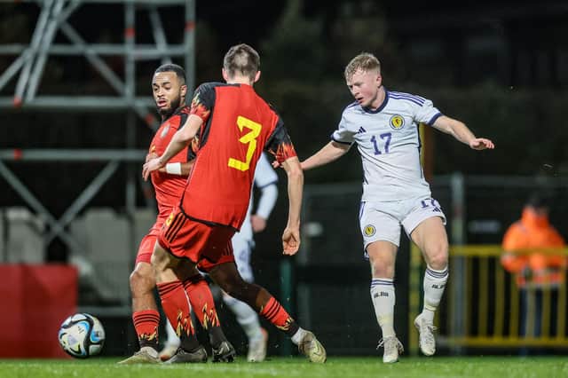 Dundee's Lyall Cameron scores for Scotland Under-21s in the 2-0 victory in Belgium. (Photo by BRUNO FAHY/BELGA MAG/AFP via Getty Images)