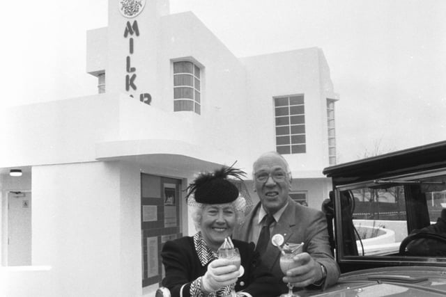 Dr George Roberts and wife Jean pose with cocktails beside their Morris Cowley, parked outside their 1930s-style Broom Milk Bar at  the Glasgow Garden Festival in April 1988.