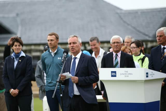 Duncan Weir makes a speech at the 2018 Junior Open at St Andrews, with 2017 Open champion Jordan Spieth standing in the background. Picture: R&A