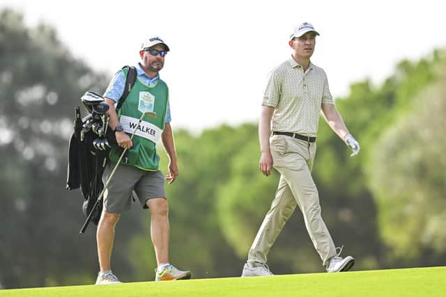 Euan Walker walks with his caddie Tim Poyser during the final round of the Rolex Challenge Tour Grand Final supported by the R&A at Club de Golf Alcanada in Port d'Alcudia, Spain. Picture: Octavio Passos/Getty Images.