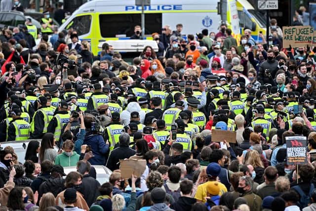 Two men detained by the Home Office are released after protestors blocked the immigration van from leaving Kenmure Street.