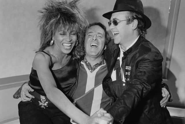 With fellow singer Elton John and chat show host Terry Wogan in 1985 (Picture: Steve Wood/Express/Hulton Archive/Getty Images)